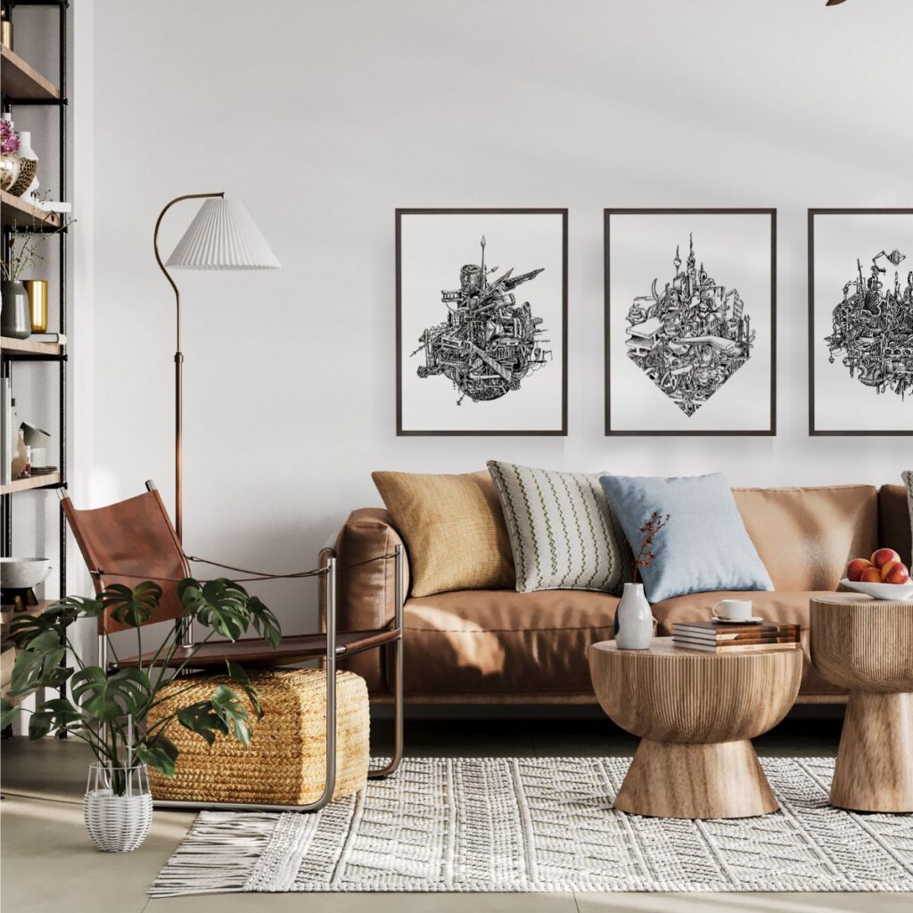 Modern living room with a set of three framed posters, including the "i-beam" and "charged" designs, adding a unique architectural and industrial style to the home decor.