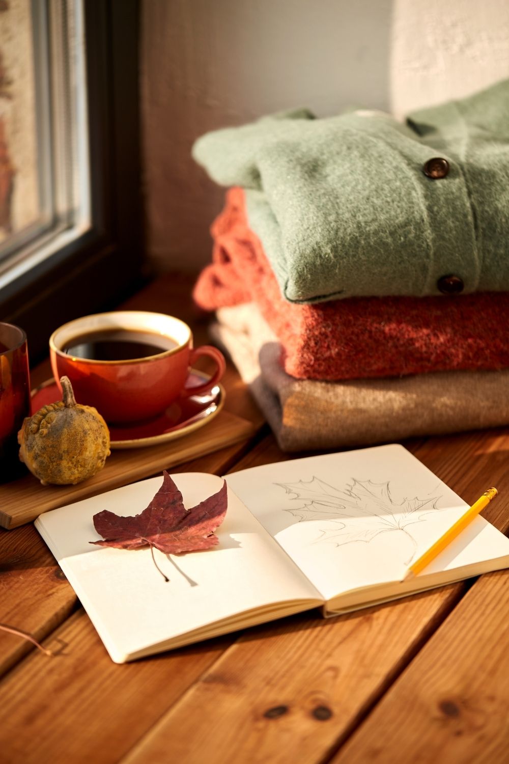 Simple fall doodles in sketchbook with cozy autumn theme