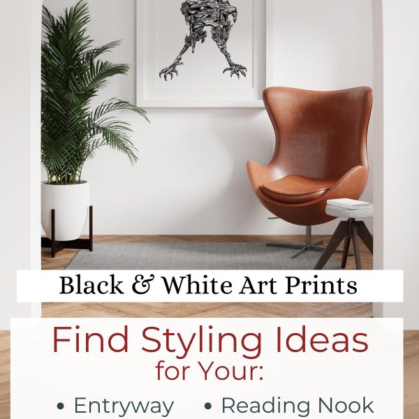 A stylish interior scene featuring a modern living space with a white archway framing the view. On the wall, there is a framed black and white art print titled "claws," depicting an abstract, intricate design resembling a mechanical creature with sharp, claw-like legs. The artwork is striking, adding a focal point to the room. Below the print, there's a sleek leather chair with a warm brown hue, offering a cozy reading nook vibe. A potted plant with lush green leaves adds a touch of nature to the space. The floor has a light wood texture, enhancing the clean and modern aesthetic. Text overlay at the bottom of the image reads: "Black & White Art Prints" and "Find Styling Ideas for Your: Entryway, Bedroom, Reading Nook, Living Room... artmefree.com" with the artmefree logo at the bottom center.